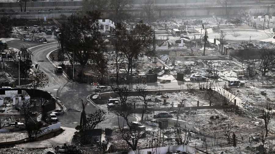 TOPSHOT-US-FIRE-HAWAII TOPSHOT - An aerial image taken on August 10, 2023 shows destroyed homes and buildings burned to the ground in Lahaina in the aftermath of wildfires in western Maui, Hawaii. At least 36 people have died after a fast-moving wildfire turned Lahaina to ashes, officials said August 9, 2023 as visitors asked to leave the island of Maui found themselves stranded at the airport. The fires began burning early August 8, scorching thousands of acres and putting homes, businesses and 35,000 lives at risk on Maui, the Hawaii Emergency Management Agency said in a statement. (Photo by Patrick T. Fallon / AFP) (Photo by PATRICK T. FALLON/AFP via Getty Images)