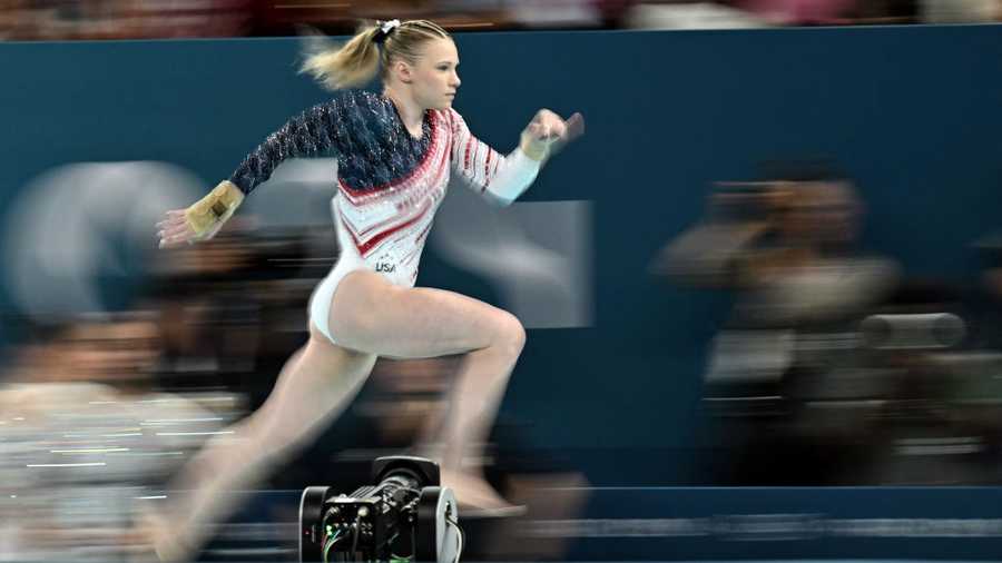 GYMNASTICS-ARTISTIC-OLY-PARIS-2024 US' Jade Carey competes in the floor exercise event of the artistic gymnastics women's team final during the Paris 2024 Olympic Games at the Bercy Arena in Paris, on July 30, 2024. (Photo by Lionel BONAVENTURE / AFP) (Photo by LIONEL BONAVENTURE/AFP via Getty Images)