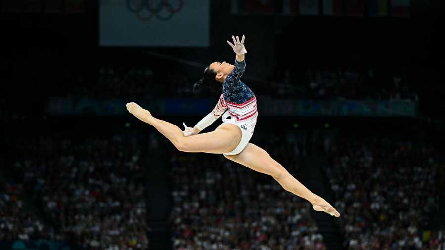 GYMNASTICS-ARTISTIC-OLY-PARIS-2024 US' Sunisa Lee competes in the balance beam event of the artistic gymnastics women's team final during the Paris 2024 Olympic Games at the Bercy Arena in Paris, on July 30, 2024. (Photo by Gabriel BOUYS / AFP) (Photo by GABRIEL BOUYS/AFP via Getty Images)