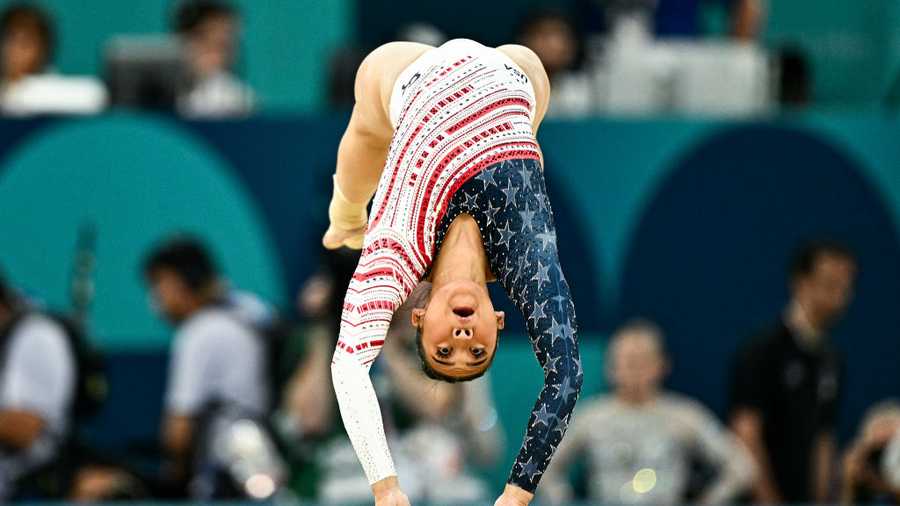 GYMNASTICS-ARTISTIC-OLY-PARIS-2024 US' Sunisa Lee competes in the floor exercise event of the artistic gymnastics women's team final during the Paris 2024 Olympic Games at the Bercy Arena in Paris, on July 30, 2024. (Photo by Gabriel BOUYS / AFP) (Photo by GABRIEL BOUYS/AFP via Getty Images)