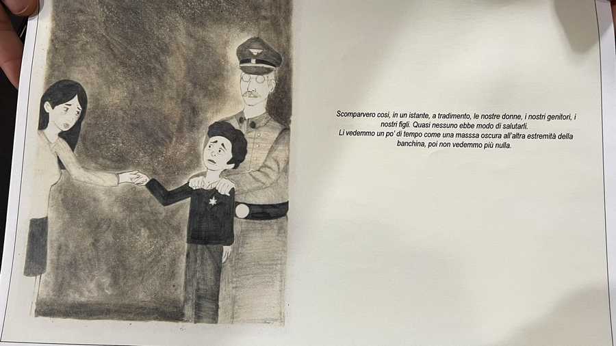 A photo showing a Jewish child being taken away from a relative. A photo showing a Jewish child being taken away from a relative.